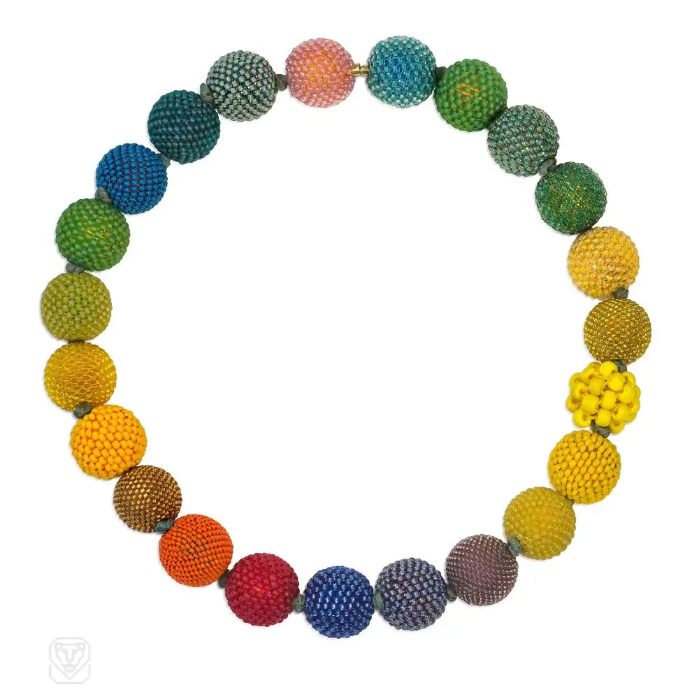 Handmade beaded ball necklace in mainly yellow, blue and green tones