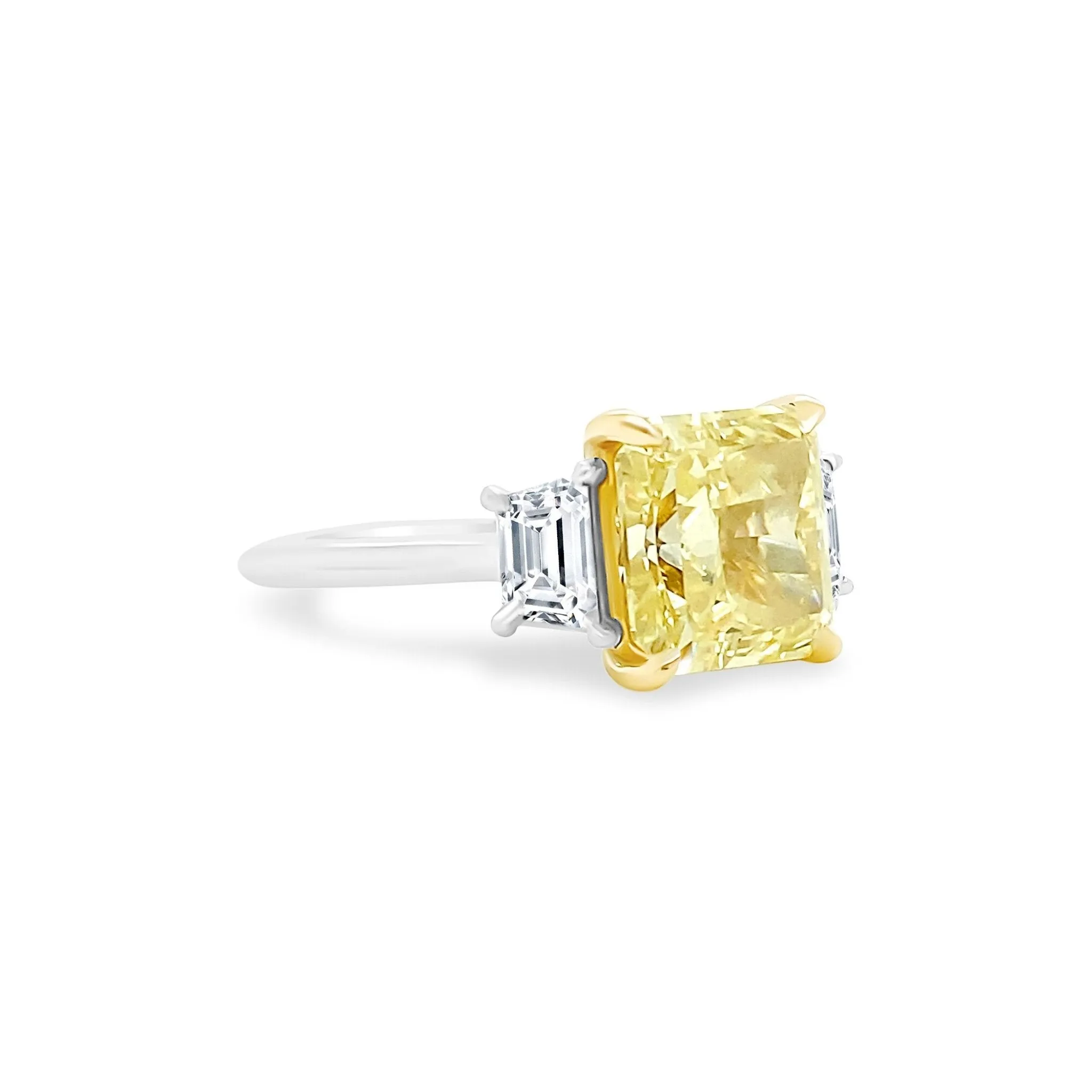 Radiant Cut Yellow Diamond with Trapezoid Cut Side Stones